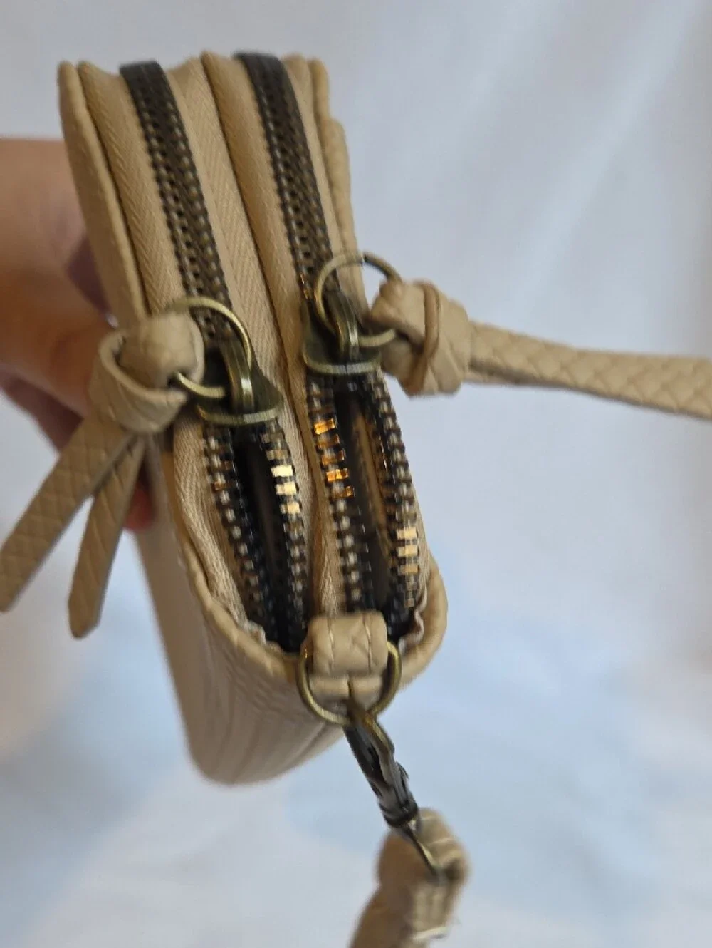 Safe Keeper Beige Textured Woven Zip Around Wristlet Wallet.